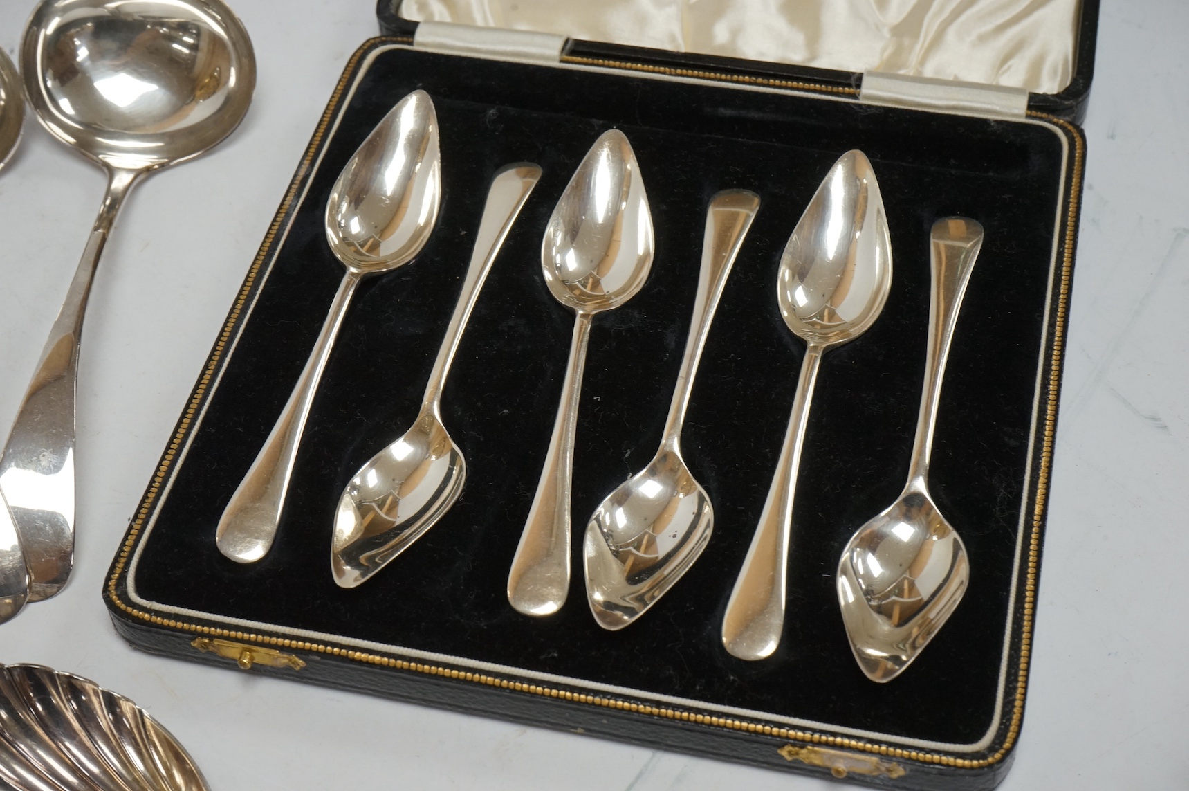 A cased set of six George V silver grapefruit spoons, Arthur Price & Co Ltd, Birmingham, 1936, together with a pair of silver Old English pattern sauce ladles, Sheffield, 1902 and a dog nose serving spoon, Mappin & Webb,
